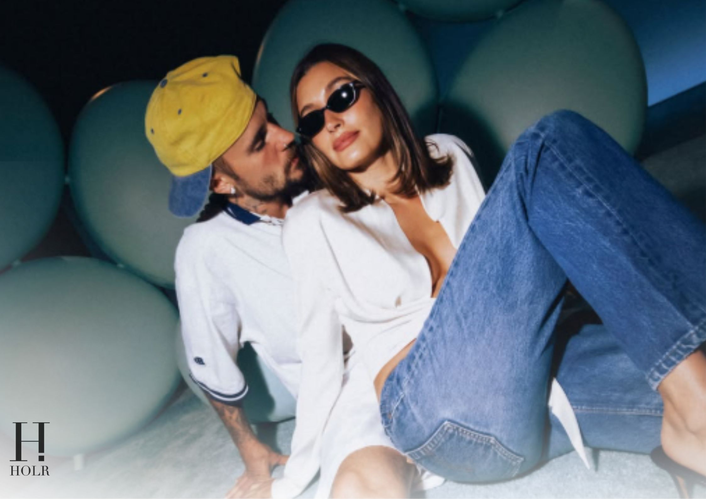 Justin and Hailey Bieber sharing a kiss for their WYouth magazine cover