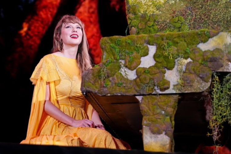 Taylor Swift poses during a public appearance as she promotes her new song written for the animated film Toy Story 5.