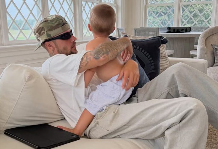 Justin Bieber smiles alongside his young son Jack in a recently shared family photo from the singer's Instagram.