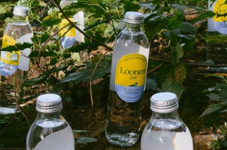 Loonen bottled water in its distinctive glass packaging, highlighting the premium wellness brand’s rise in popularity.