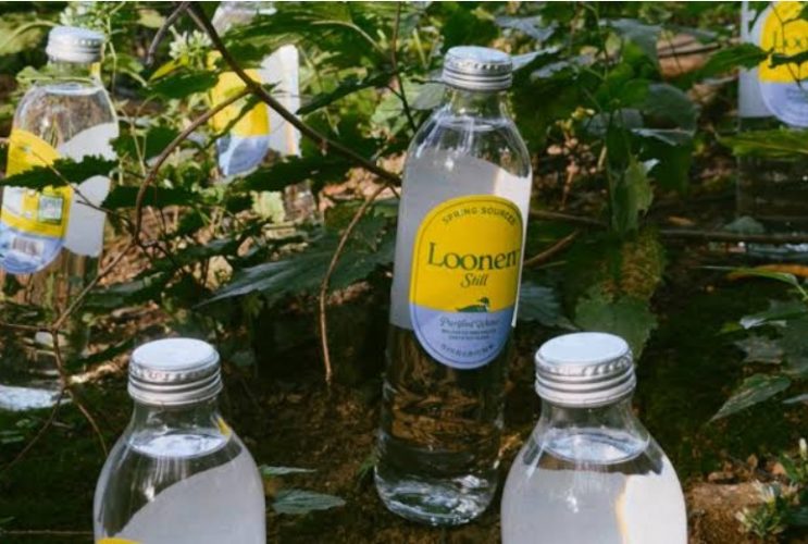 Loonen bottled water in its distinctive glass packaging, highlighting the premium wellness brand’s rise in popularity.