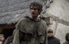 Andrew Garfield as Ploughman stands amid a tense medieval crowd in The Uprising, a gritty drama about England’s Peasants’ Revolt.