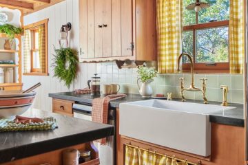 A charming traditional home interior showcases decorative wood trim, vintage-style hardware, and classic architectural details that add nostalgic character.