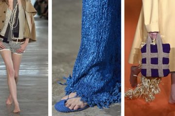 A Spring/Summer 2027 runway model walks barefoot in a polished fashion look during New York Fashion Week.